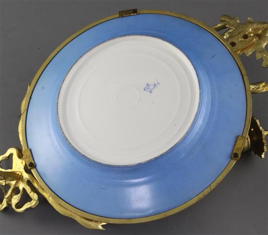 A pair of Sevres style porcelain plates, height 15in. diameter 10in.